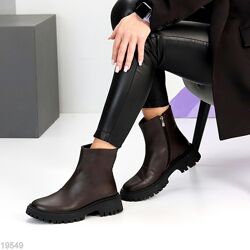 Коричневі та чорні шкіряні зимові черевики, ботінки 