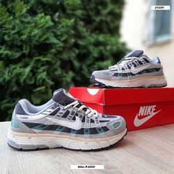 Кросівки жіночі Nike P-6000 сірі з зеленим