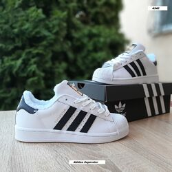 Зимові жіночі кросівки Adidas Superstar білі з чорним