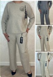 Польща 48-50, 50-52 Стильний костюм-двійка кофта з квіткою та брюки