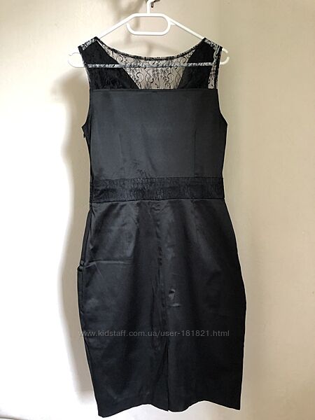 Маленькое черное платье с кружевными вставками французского бренда