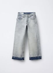 широкі джинси Zara на дівчинку стильні джинси Zara з необробленим низом 