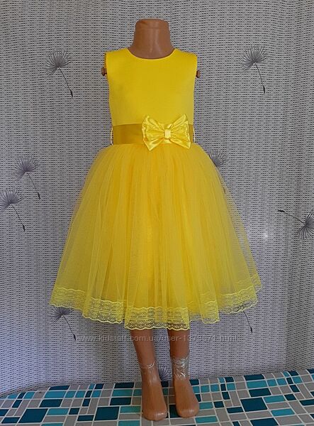 Нарядна дитяча жовта сукня з бантом і мереживом, модель 47
