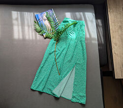 Літня спідниця міді з розрізом на ніжці в квітковий принт