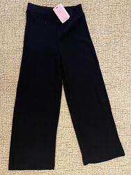 Вязані штани брюки палаццо в рубчик