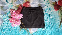 Коротка сіра підниця з бантом