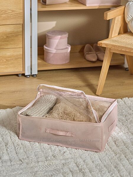 Рожевий органайзер для одягу 