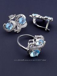 Комплект украшений серьги и кольцо с голубыми фианитами код 1553