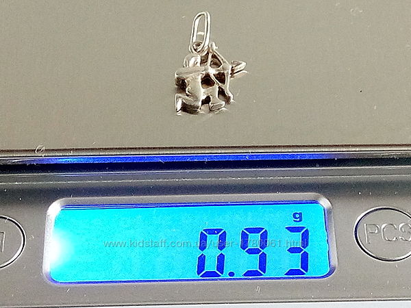 Серебряный кулон стрелец, 0,94 грамма,925 пробы.