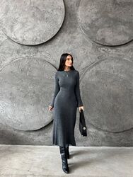 Сукня міді приталеного крою. Виготовлена із мякого, приємного до тіла трик