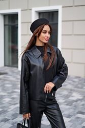 Шкіряний бомбер на блискавці. Стилізуйте його з класичними брюками, джинсам