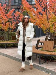 Дутий пуховик в довжині максі - ідеальне рішення на холодну пору. Лаконічни