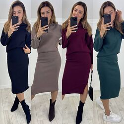 Костюм спідниця талія на резинці, збоку розріз. Кофта горловина застібаєтьс