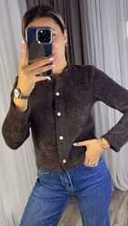 Кофтинка з мякої тканини, застібається на ґудзики, прямого крою, тканина т