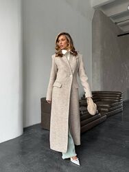 Зимове пальто. Подовжений силует, витончені лацкани. Пальто виготовлене з я